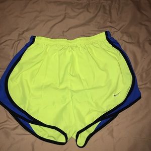Neon Nike running shorts